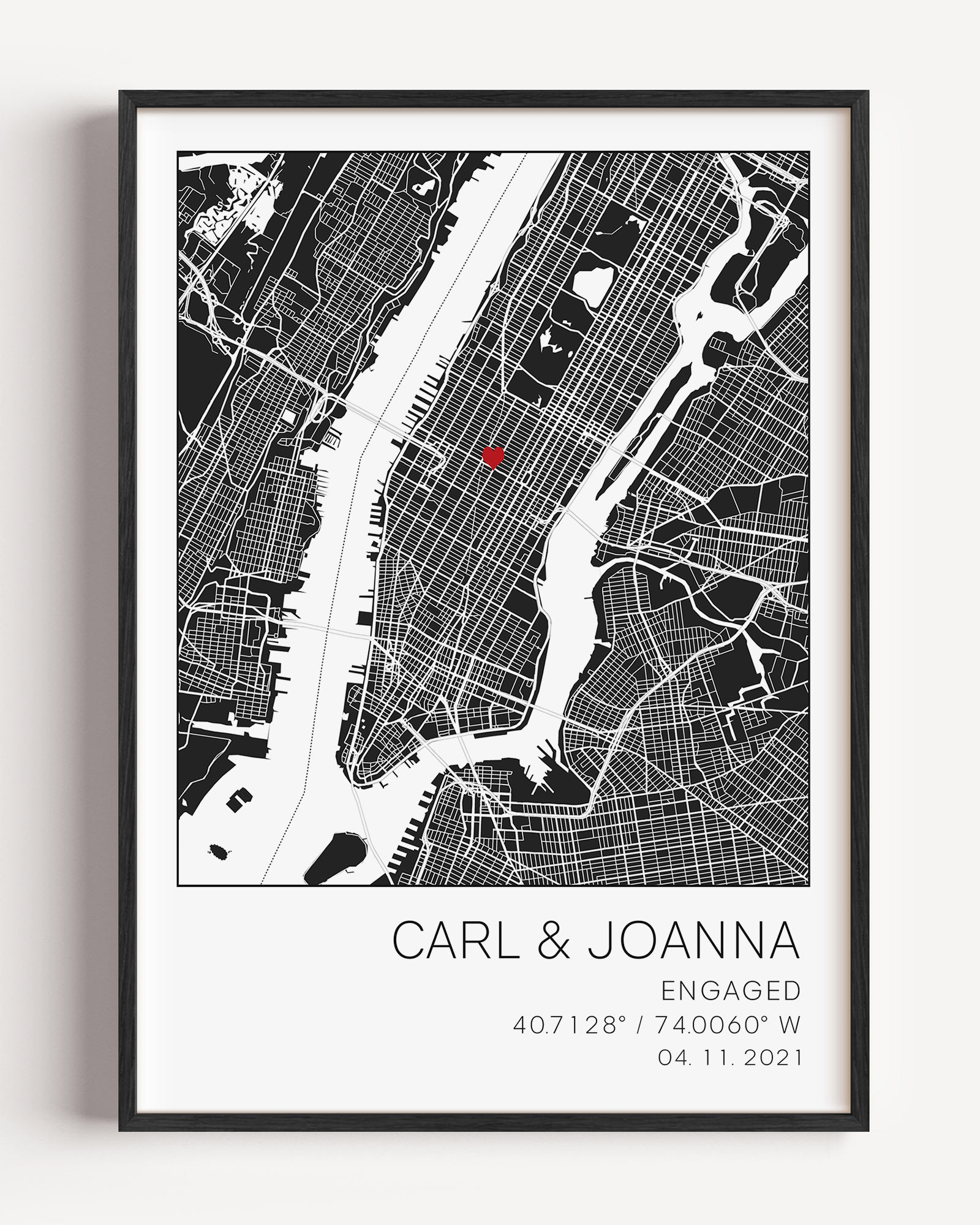 Modern framed engagement map print featuring minimalist black street lines with a red heart pinpoint marking the proposal location, personalized with couple’s names and engagement date in elegant script”
