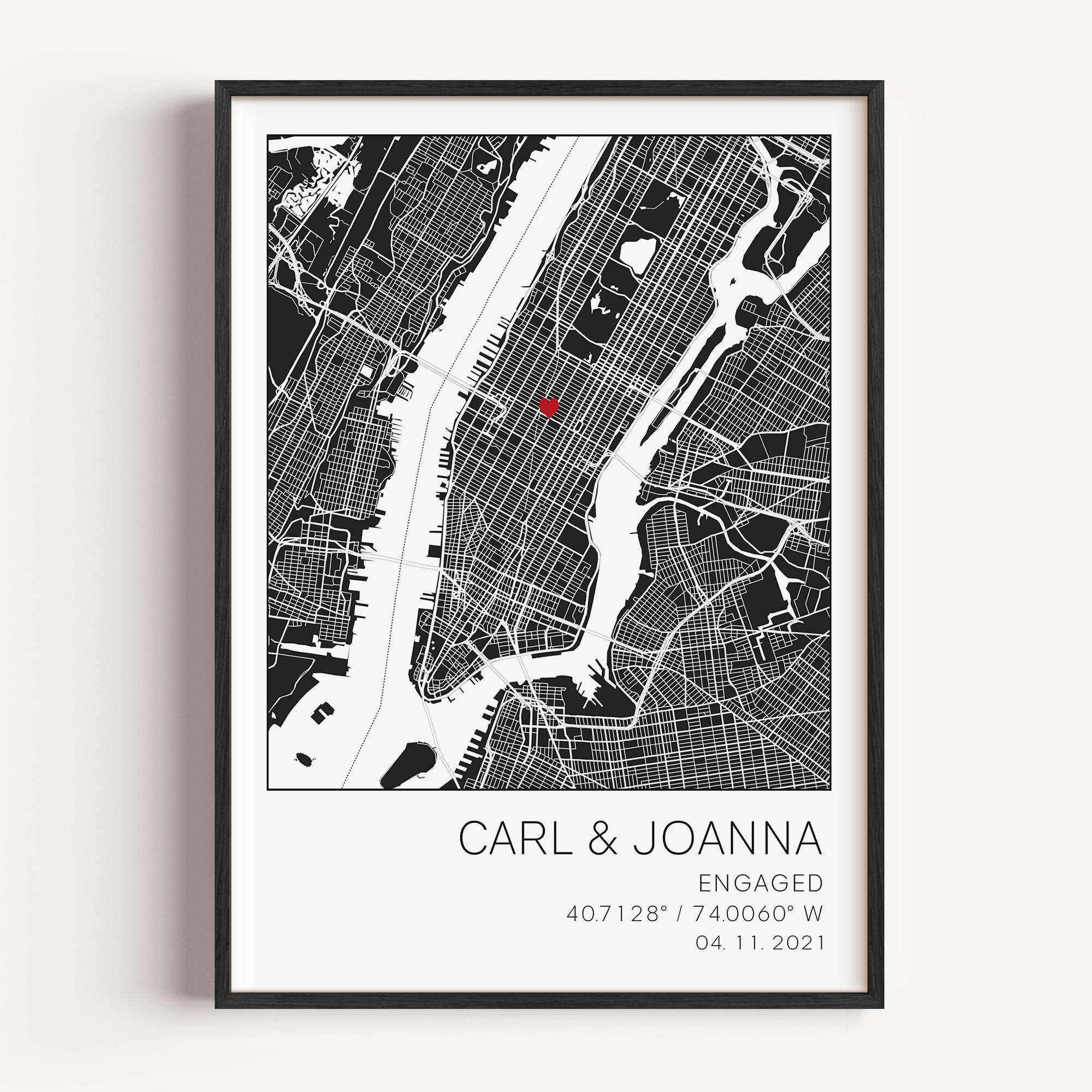 Modern framed engagement map print featuring minimalist black street lines with a red heart pinpoint marking the proposal location, personalized with couple’s names and engagement date in elegant script”