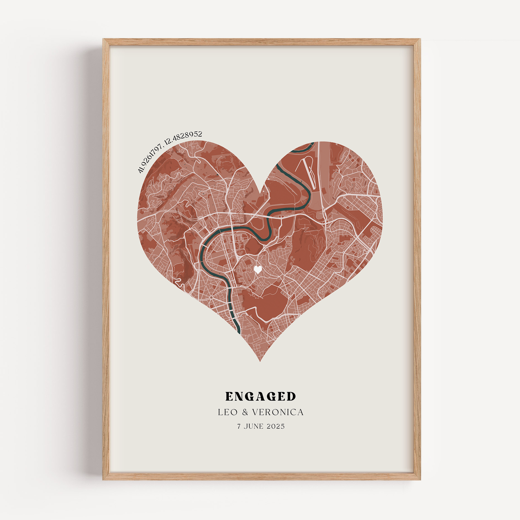 Heart-shaped map print with 'Engaged' text and names, custom coordinates and the location of the engagement