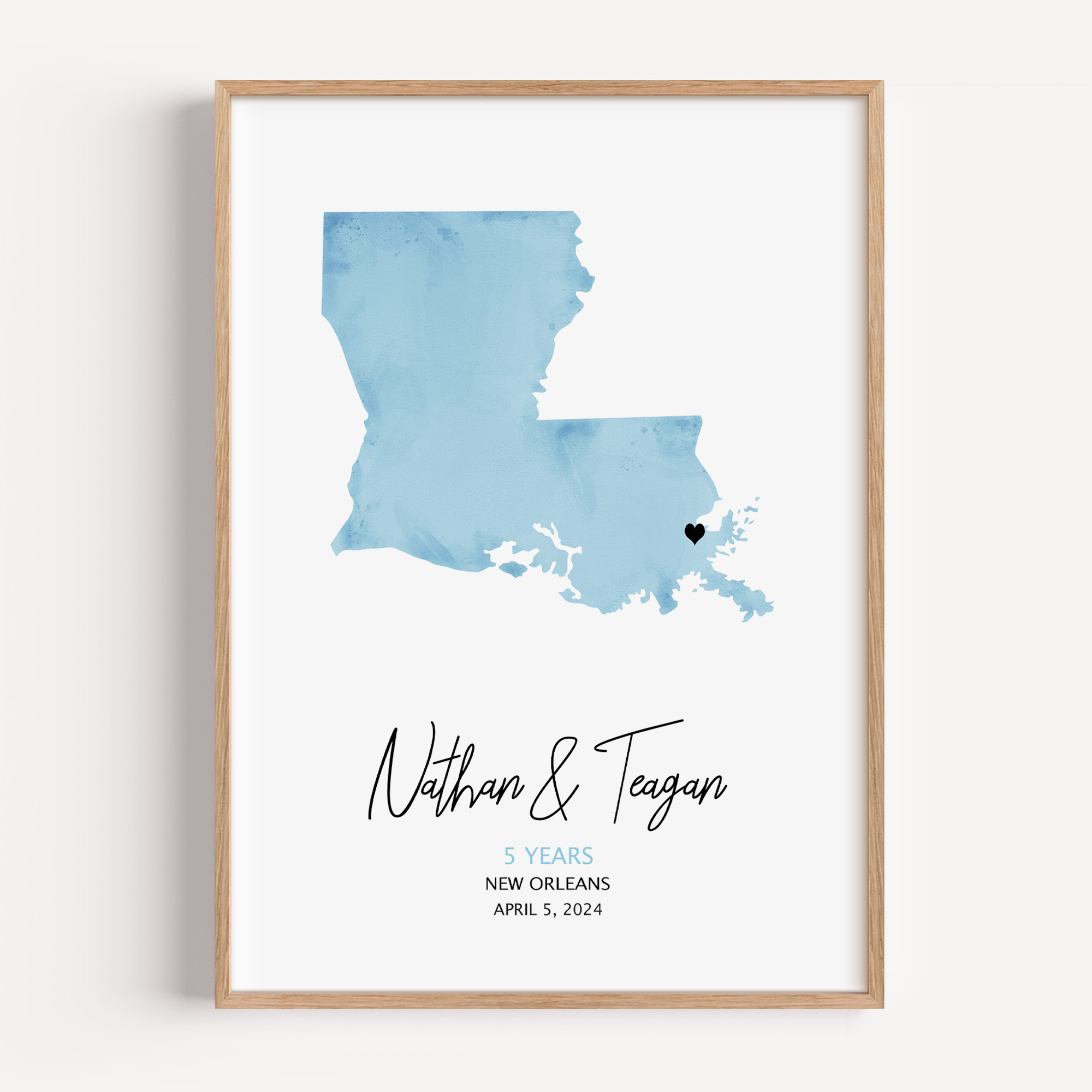 Custom watercolor map print showcasing a softly blended, artistic map of a chosen location, personalized with coordinates, names, and a special date.