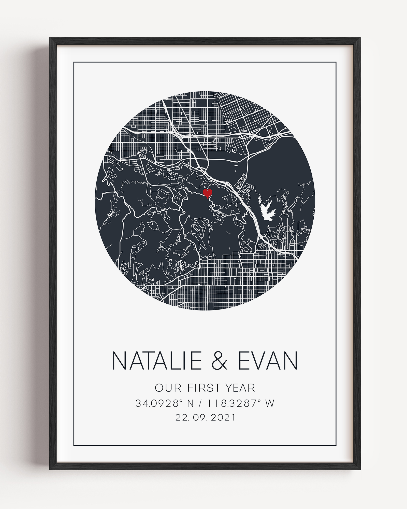 Custom anniversary map print showing a heart-shaped map centered on a meaningful location, marked with geographic coordinates and personalized names or date.