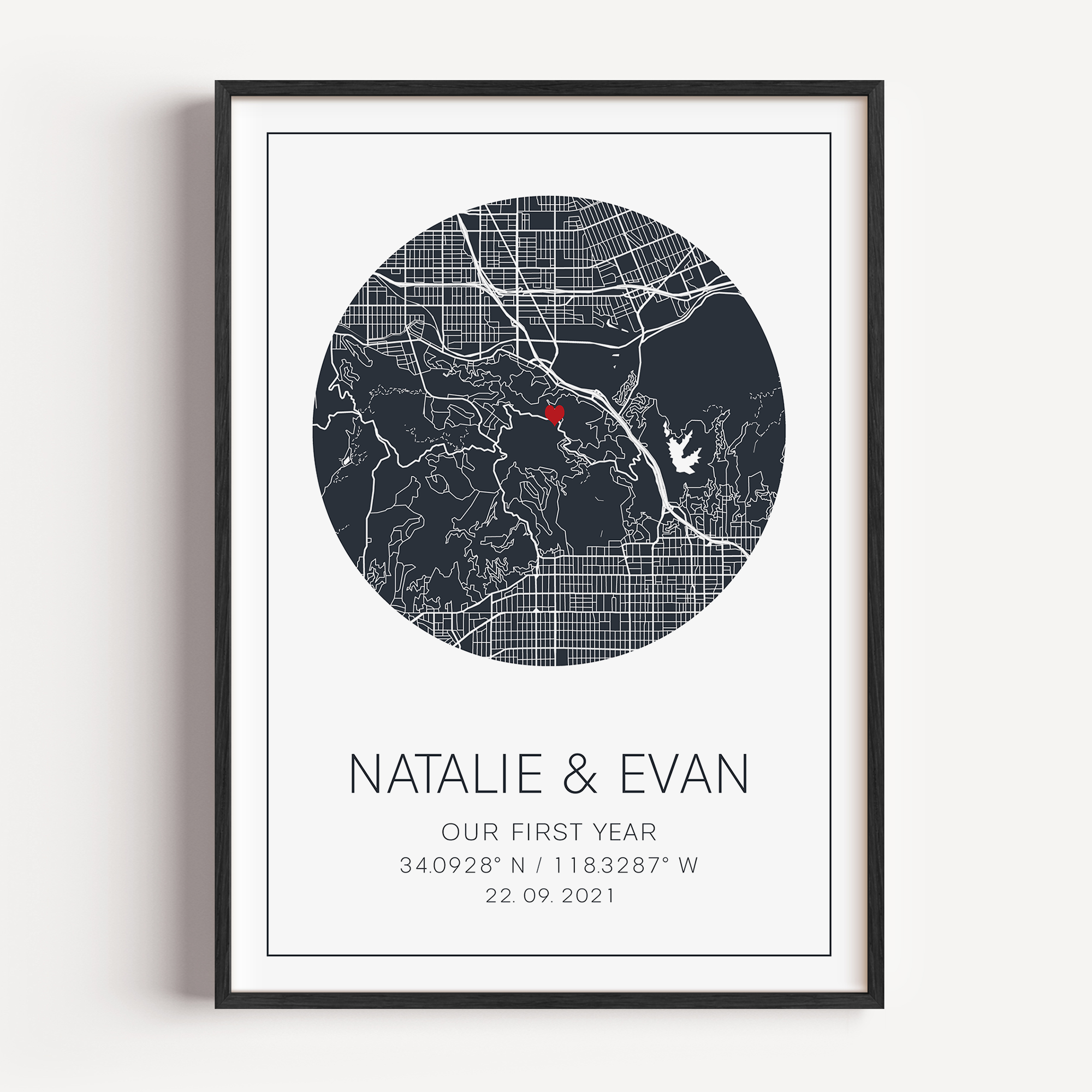 Custom anniversary map print showing a heart-shaped map centered on a meaningful location, marked with geographic coordinates and personalized names or date.