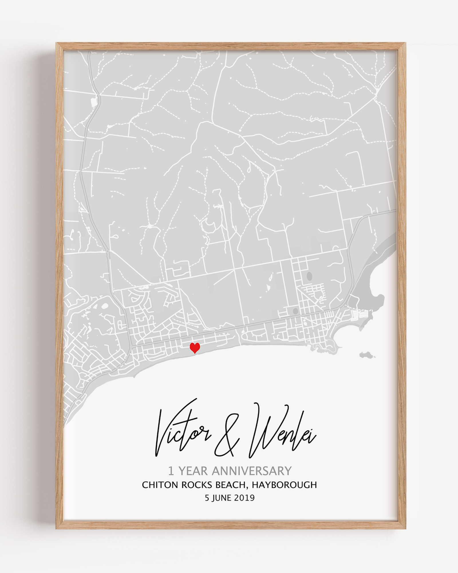 A paper anniversary gift idea which is a custom map print showcasing 1 year anniversary gift text