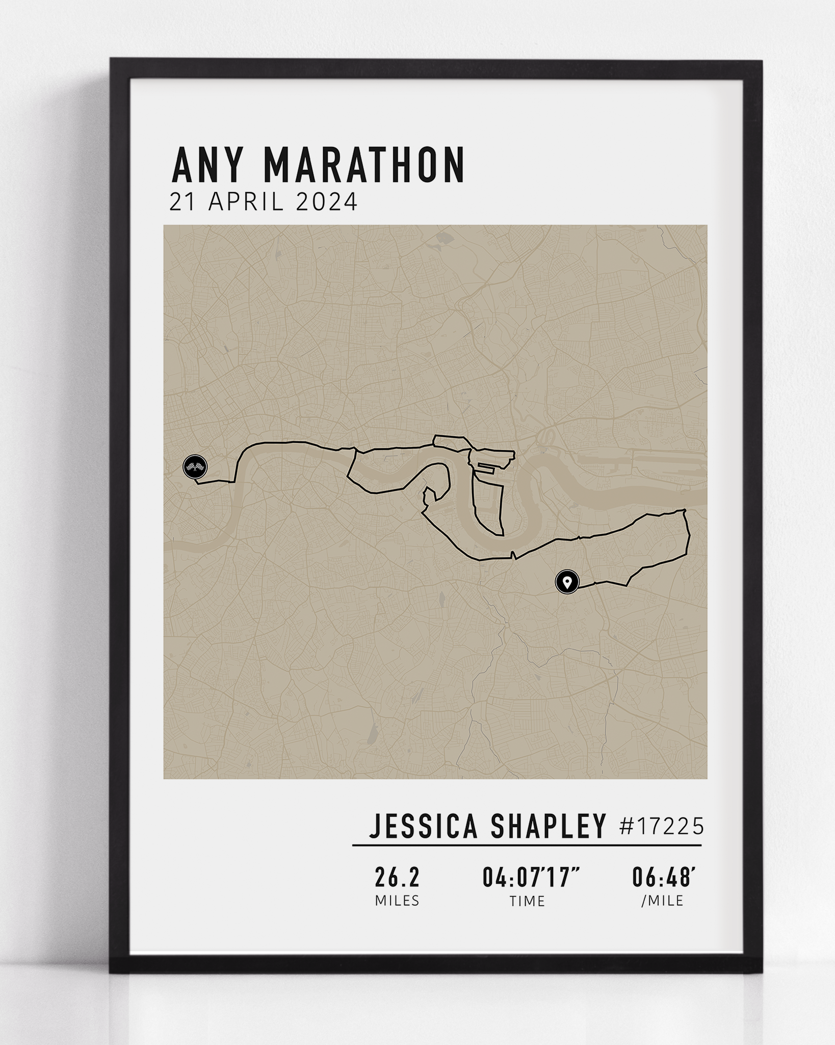 Framed custom art print of a marathon route, showing a minimalist line map of the running course with labeled start and finish points, event name, date, and distance.