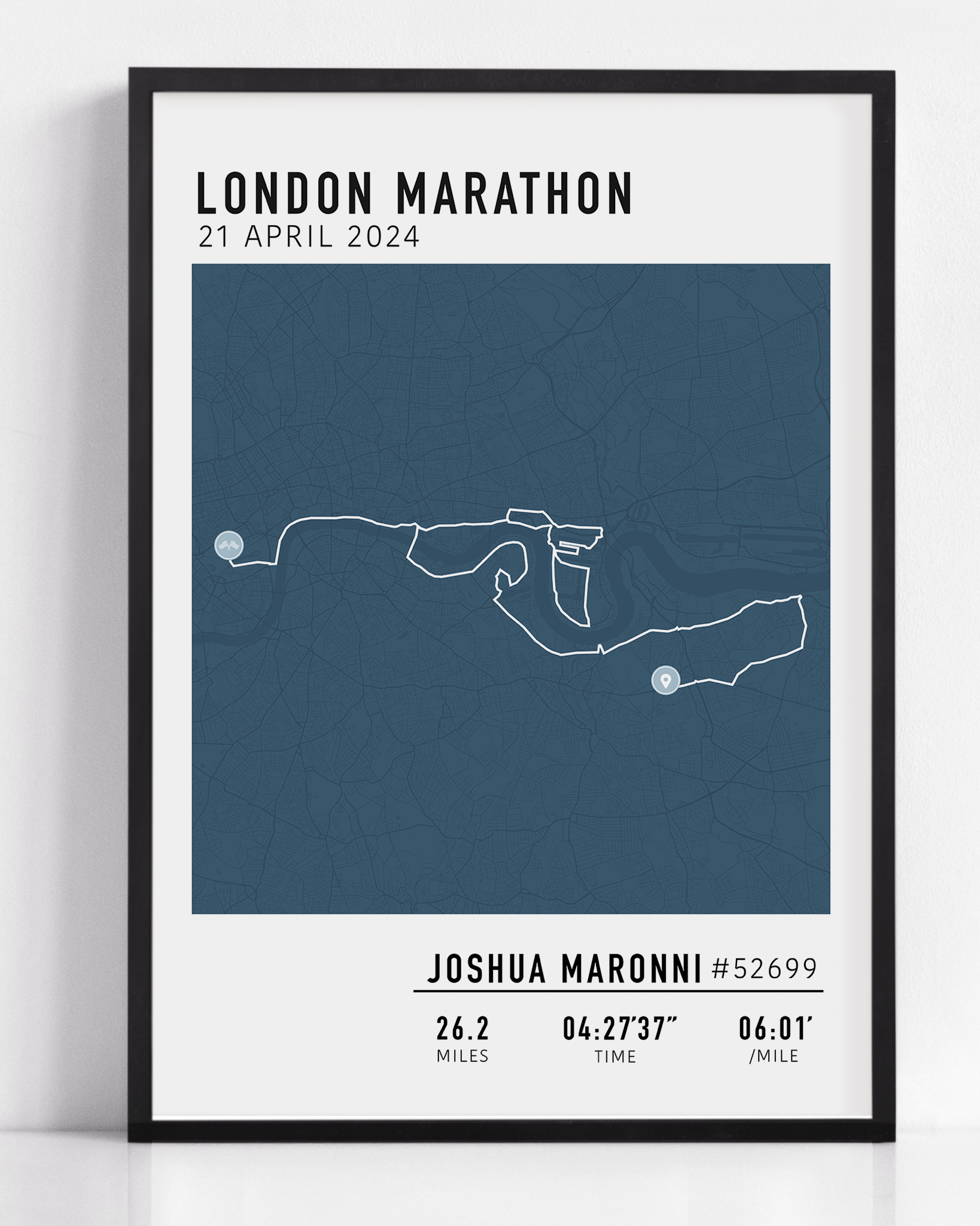 Framed custom art print of a marathon route, showing a minimalist line map of the running course with labeled start and finish points, event name, date, and distance.
