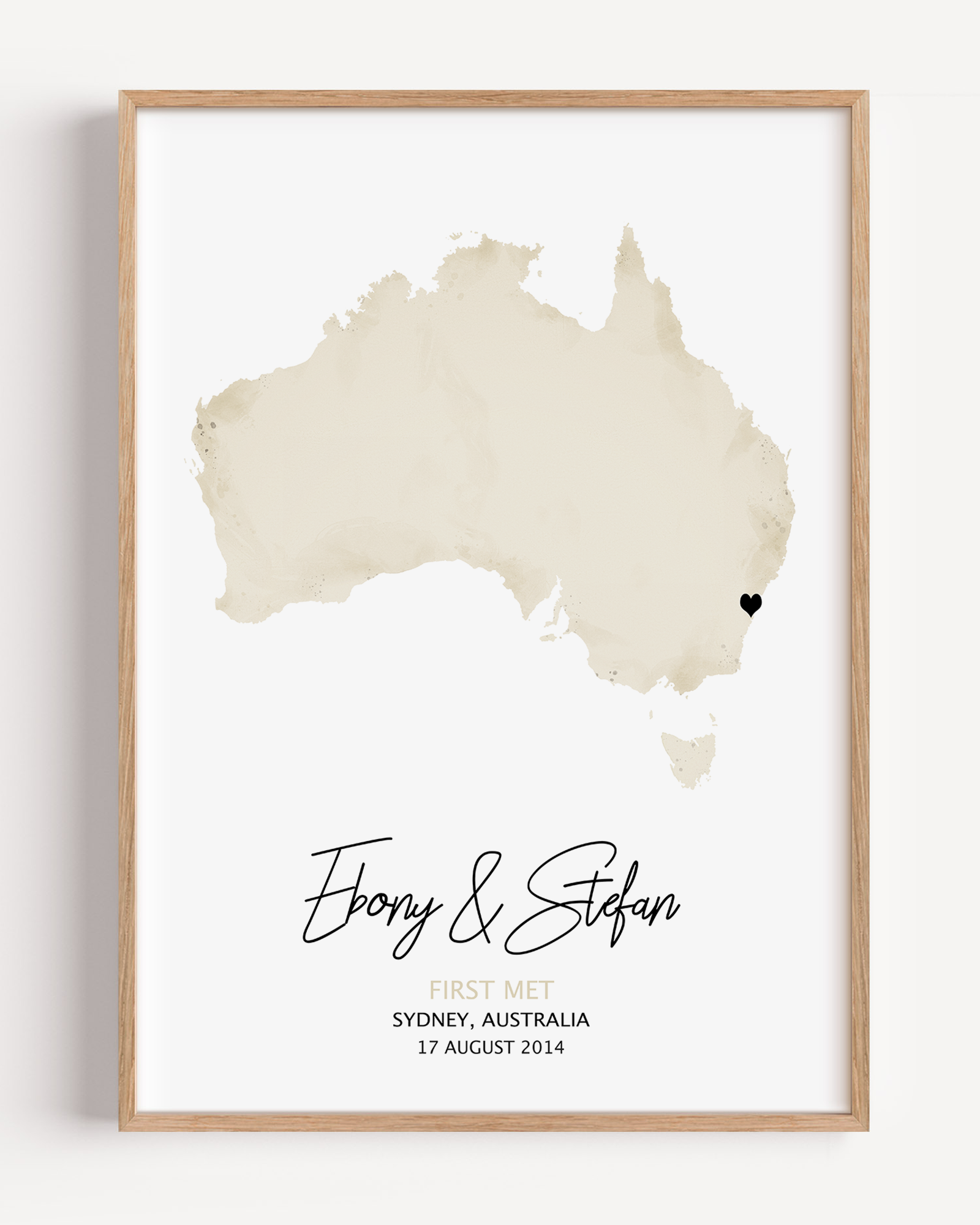 Framed custom watercolor map print of the location where a couple first met, personalized with names and date – sentimental artwork gift.