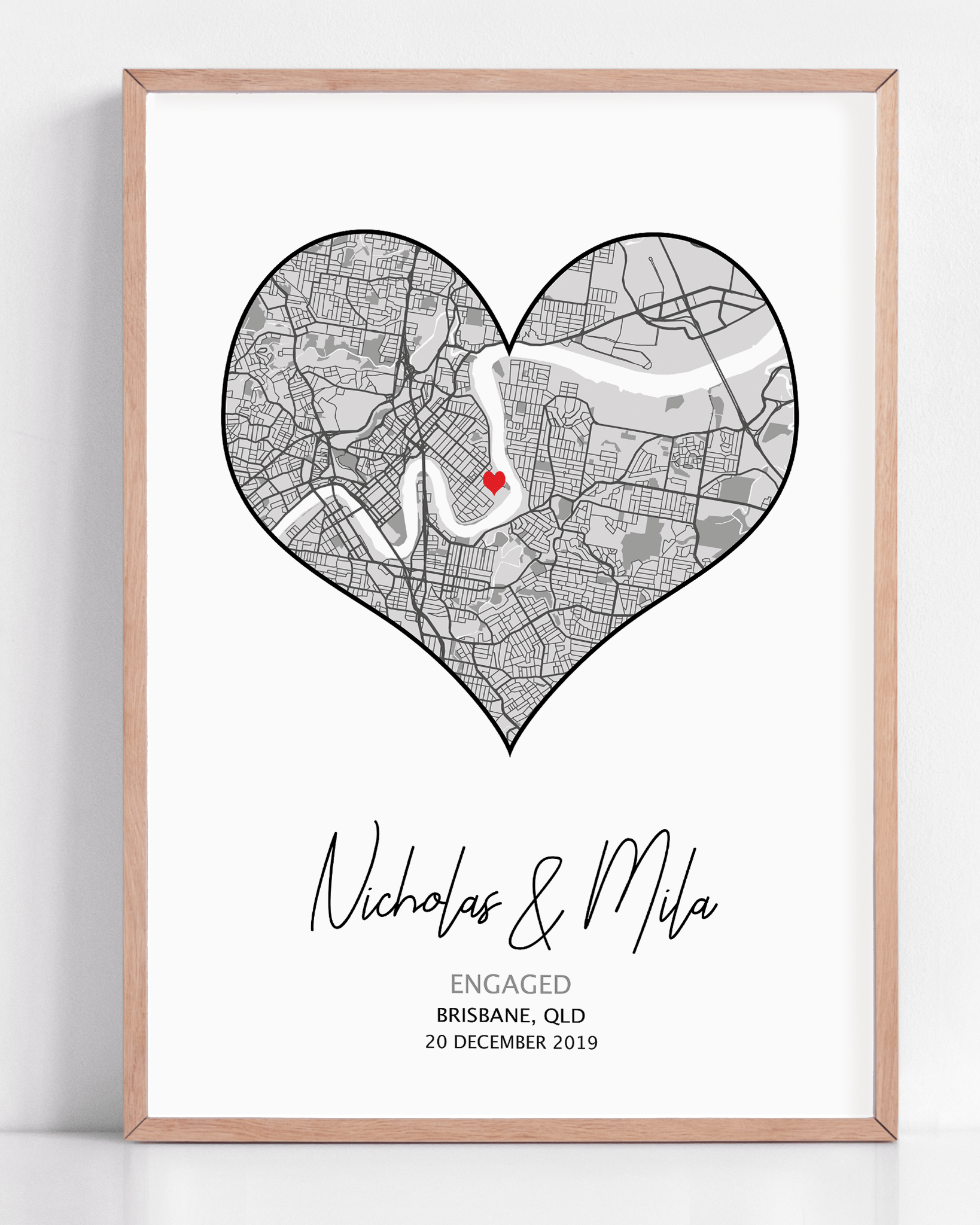 A framed engagement gift of a heart map