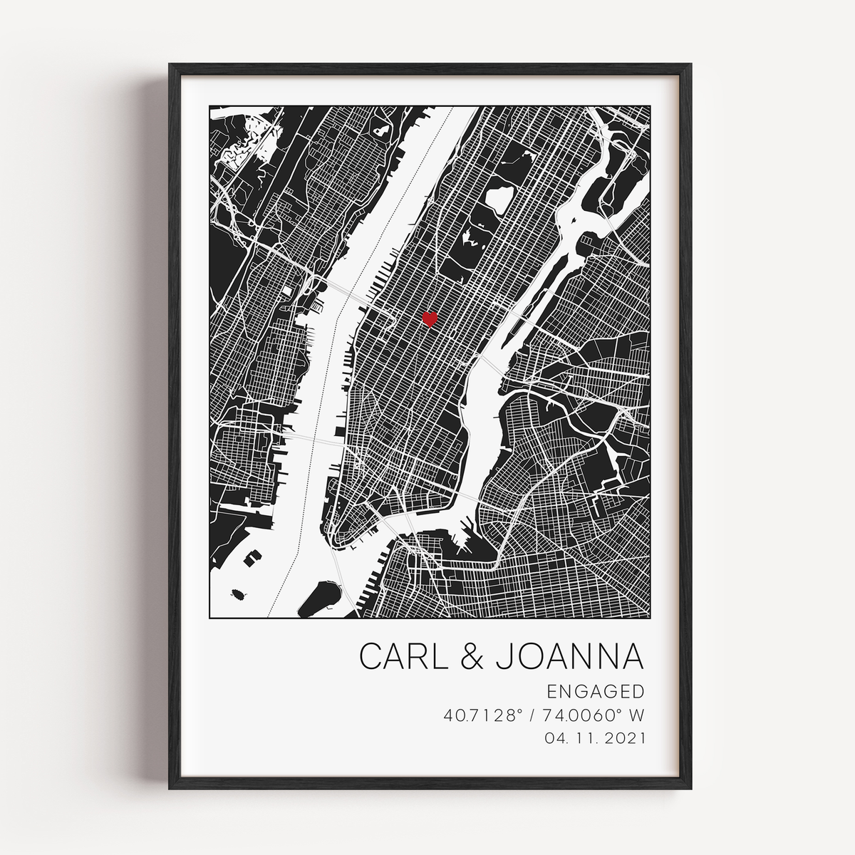 Modern framed engagement map print featuring minimalist black street lines with a red heart pinpoint marking the proposal location, personalized with couple’s names and engagement date in elegant script”