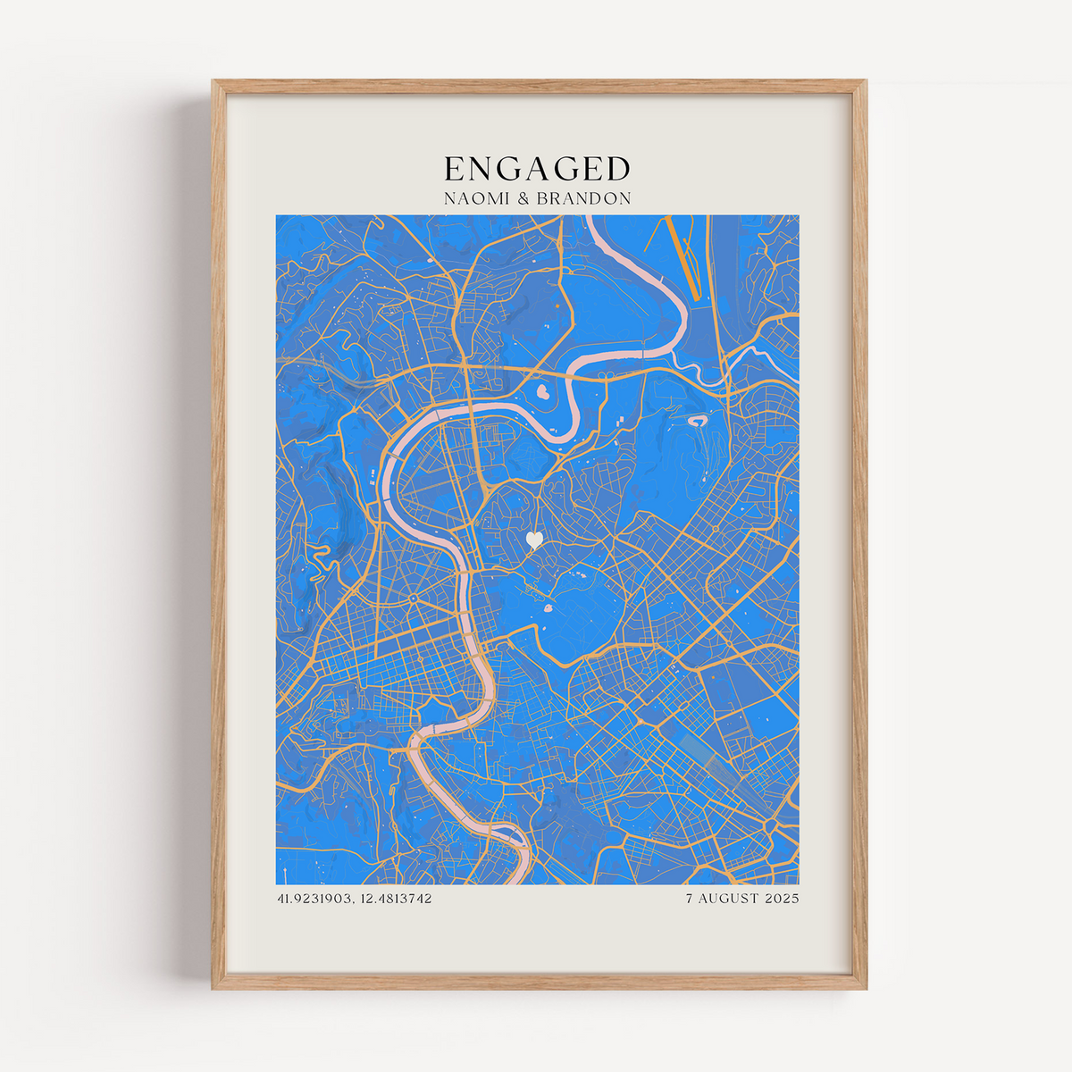 Framed engagement map print with vibrant map and custom details of the engagement including location, coordinated and names of the couple