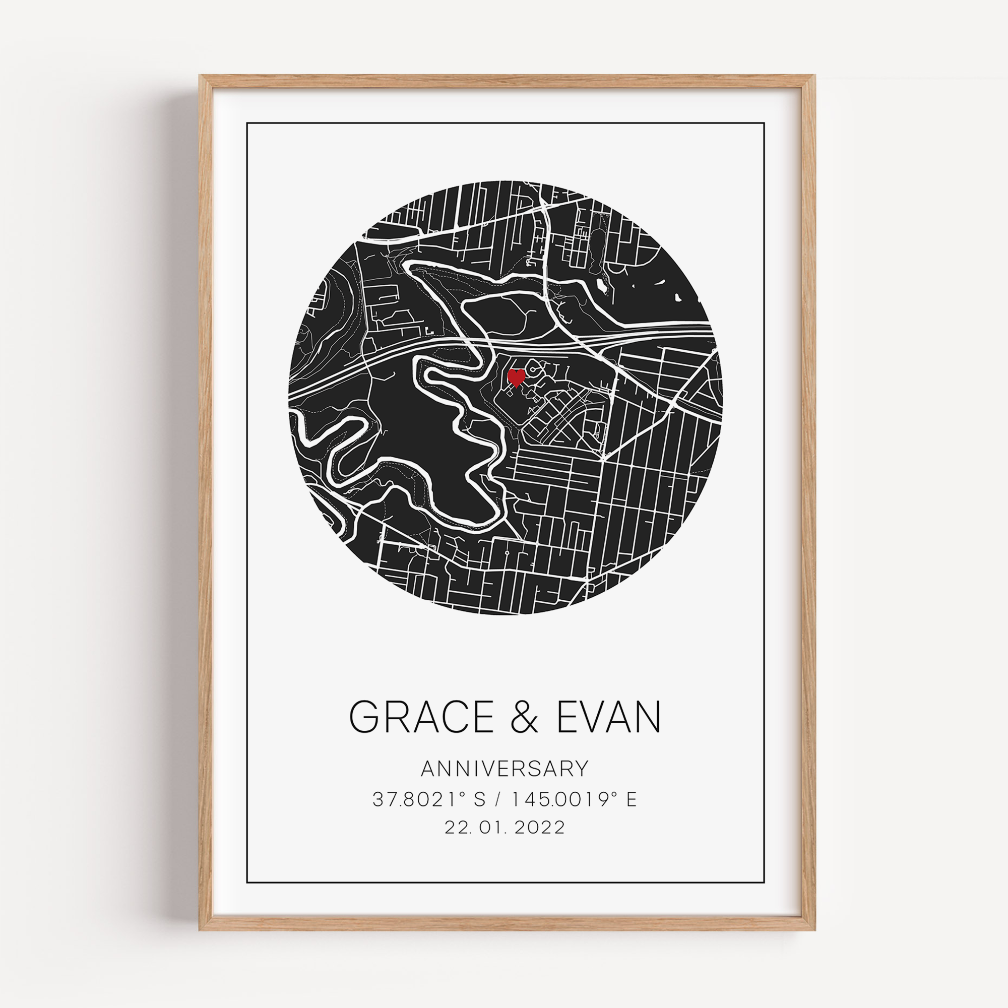 Custom anniversary map print showing a heart-shaped map centered on a meaningful location, marked with geographic coordinates and personalized names or date.