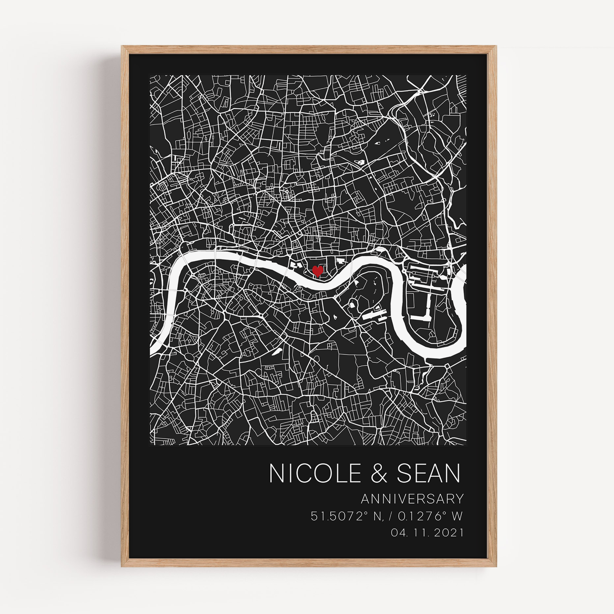 Custom anniversary map print showing a heart-shaped map centered on a meaningful location, marked with geographic coordinates and personalized names or date.