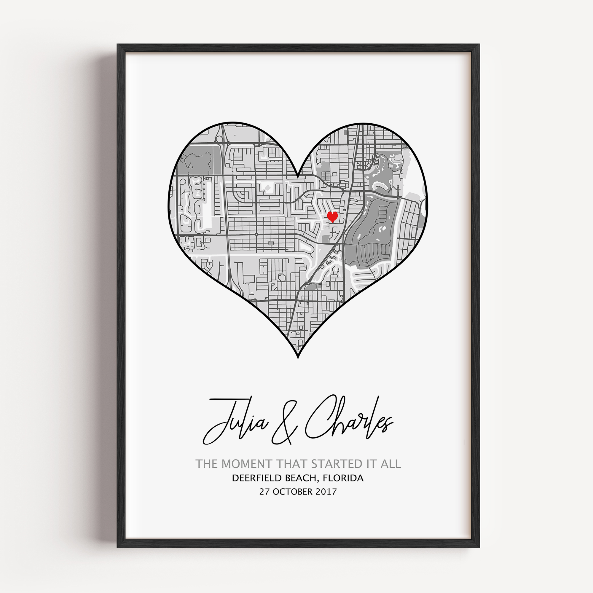 Heart-shaped custom map print featuring a meaningful location with personalized coordinates, names, and date—symbolizing love and a special memory.