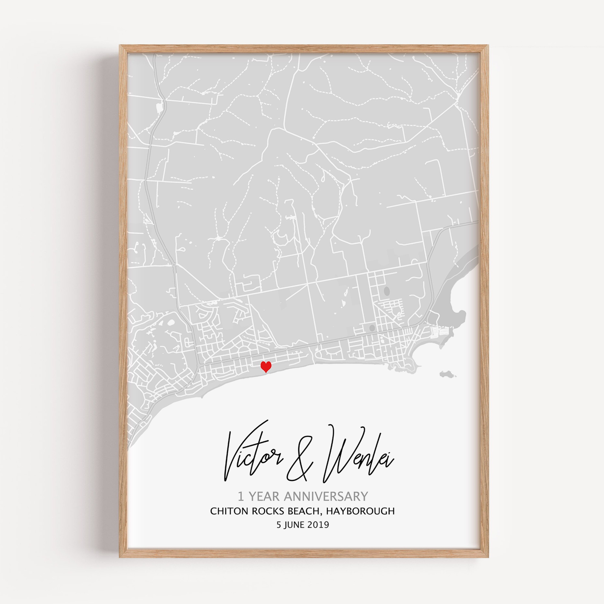 A paper anniversary gift idea which is a custom map print showcasing 1 year anniversary gift text