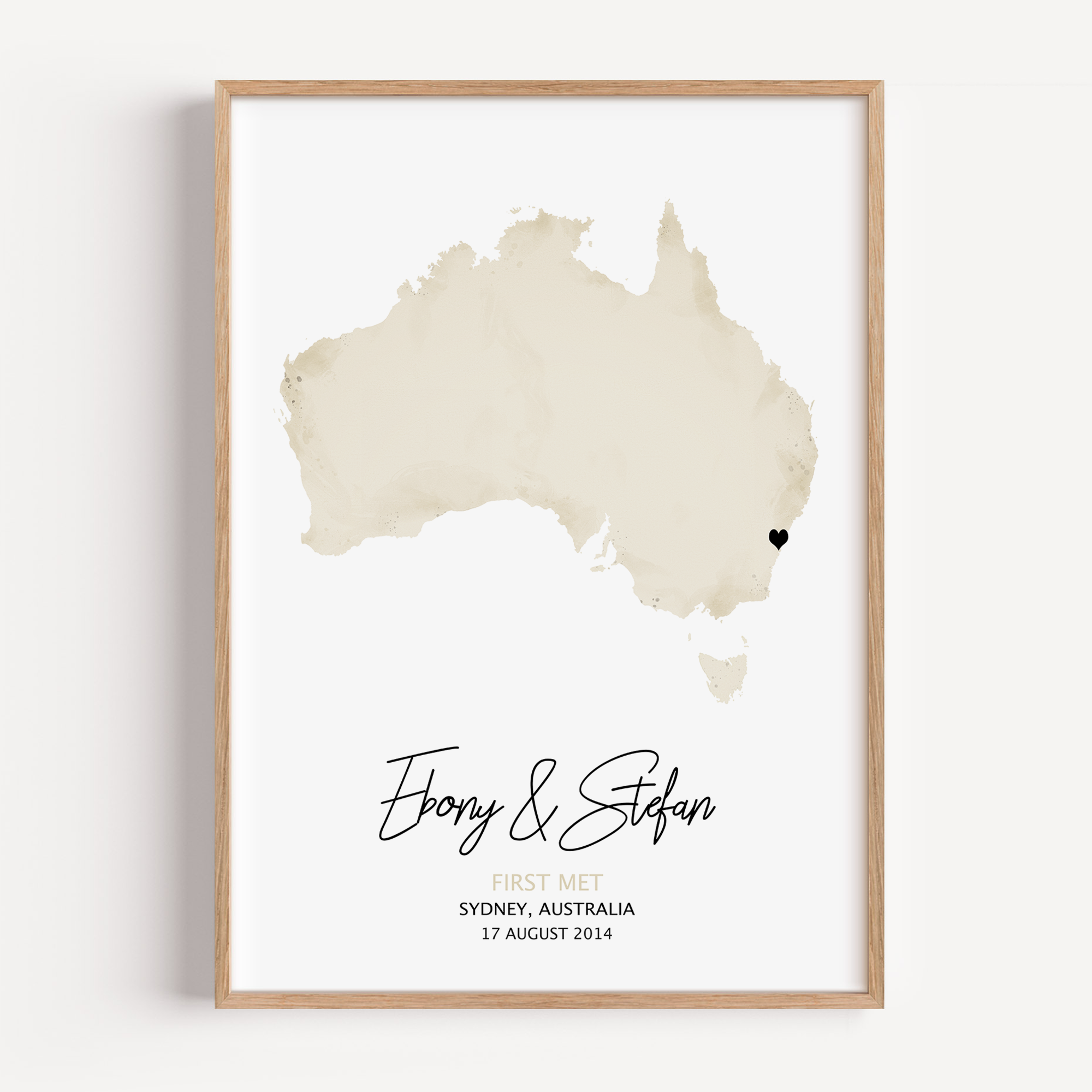 Framed custom watercolor map print of the location where a couple first met, personalized with names and date – sentimental artwork gift.