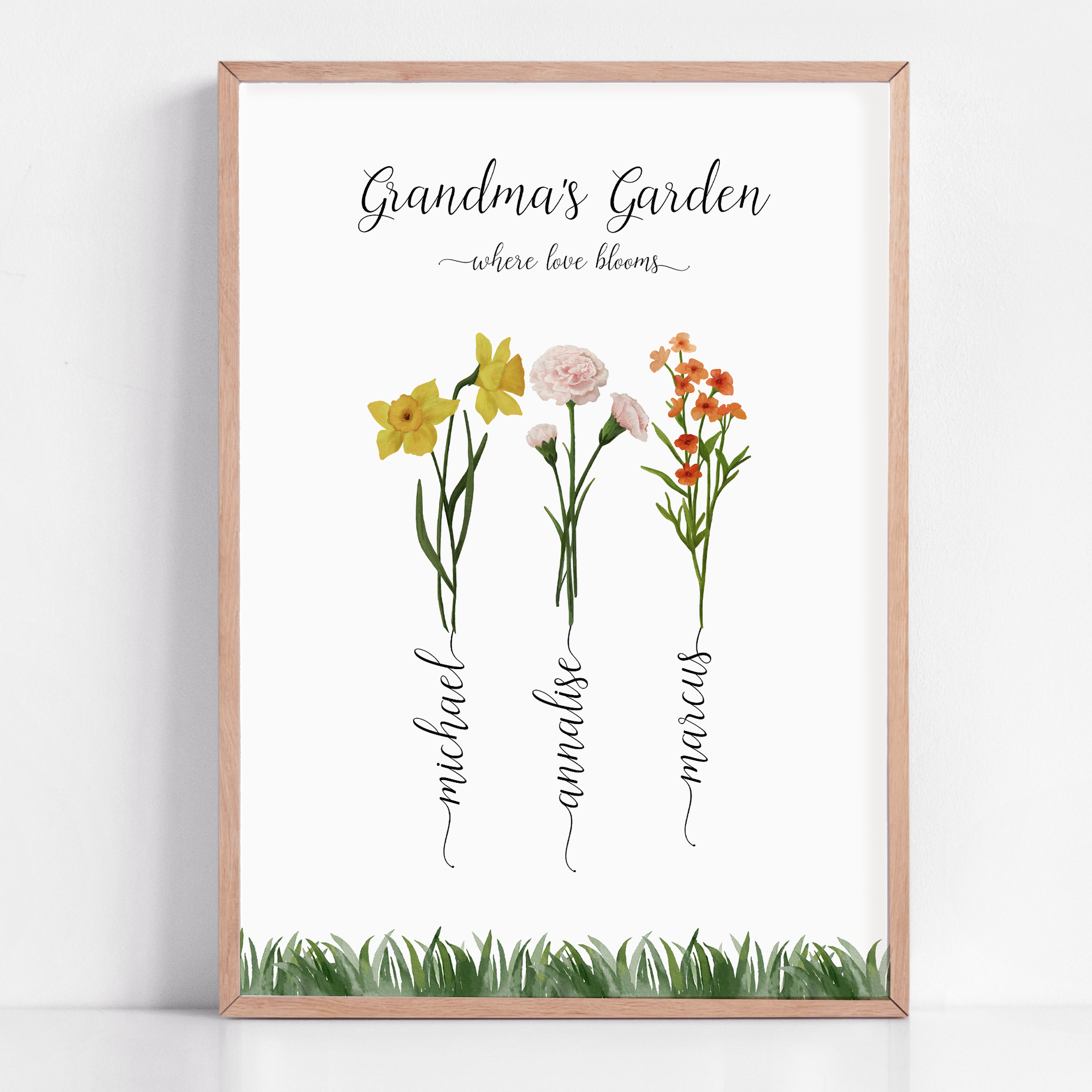 A beautiful framed print titled "Grandma's Garden," featuring delicate illustrations of birth month flowers representing each grandchild, creating a heartfelt and personalized gift for Grandma.