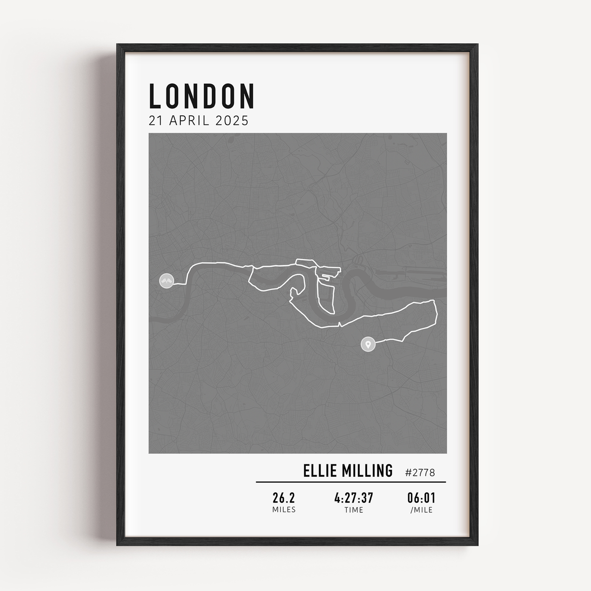 Framed custom art print of london marathon route, showing a minimalist line map of the running course with labeled start and finish points, event name, date, and distance.