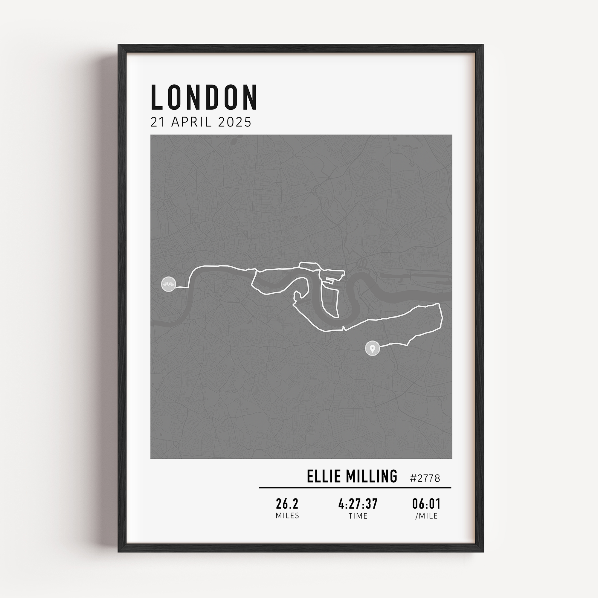Framed custom art print of london marathon route, showing a minimalist line map of the running course with labeled start and finish points, event name, date, and distance.