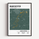 Framed Manchester Marathon commemorative display showing a detailed race course map alongside a slot for the finisher medal.