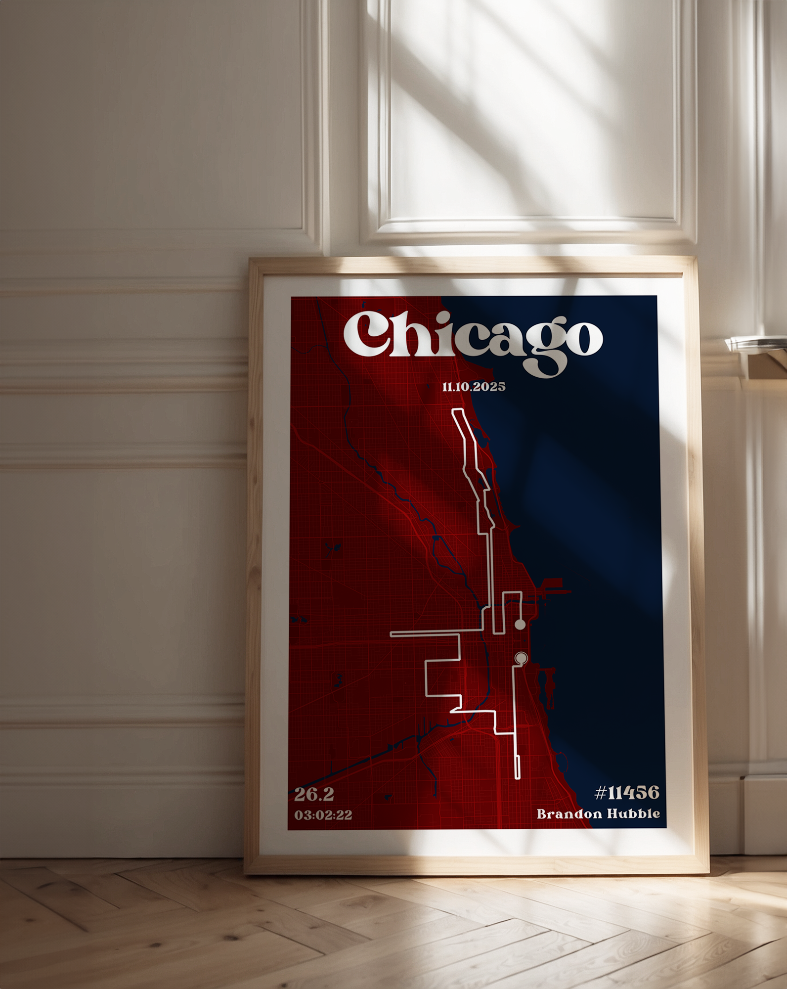 A custom marathon map poster featuring the Chicago city street grid and race route. The design includes "Chicago" in a bold, vintage serif font at the top, along with the race date, finishing time, distance, bib number, and the runner’s name.