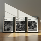 Three framed prints of running routes in London, Berlin, and Boston on a wall.