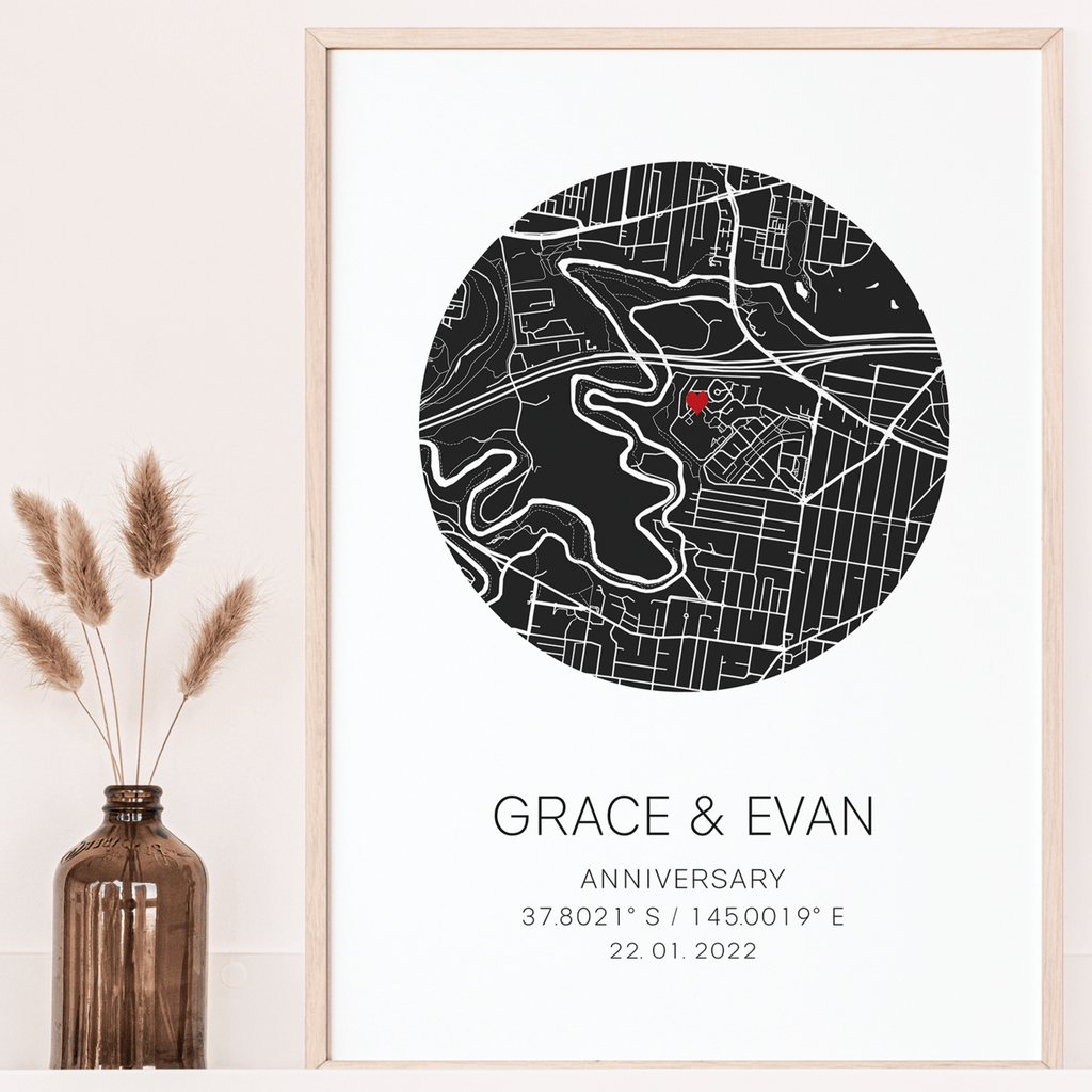 A framed print of a paper anniversary gift print. This custom map print shows the anniversary map gift. The design is unique to your date, location and is purchased as a personalized gift.