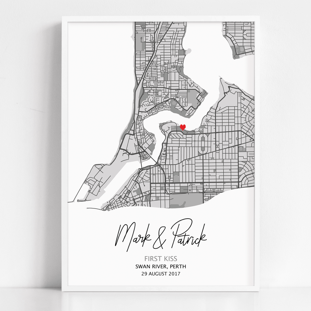 a framed print of a personalized first kiss map print. A custom design that is personalized to your date, location and couple's names gift.